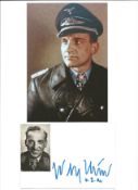 WW2, Luftwaffe ace Hans Ulrich Rudel signature piece featuring two photographs of Rudel in his