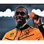 Olympics, Usain Bolt signed 10x8 colour photograph. Jamaican sprinter, widely considered to be the