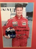 David Coulthard MBE Hand signed 13x17 Colour Photo in Frame. Overall size is 18x14. Dedicated.