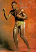Boxing, Frank Bruno signed 12x8 colour photograph pictured wearing the WBC Heavyweight belt,