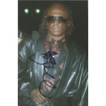 Music, Miles David signed 8 x6 colour photograph signed in Cologne a few weeks before he died. Miles