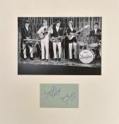 DAVE CLARK FIVE signed Album Page by Dave Clark and Lenny Davidson. Overmounted beneath Photo of The