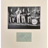 DAVE CLARK FIVE signed Album Page by Dave Clark and Lenny Davidson. Overmounted beneath Photo of The