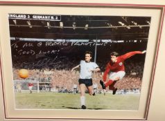 Sir Geoff Hurst MBE Hand signed 15x11 Colour Photo In wood effect Frame measuring 21x25. Signed in