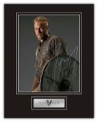 Stunning Display! Vikings Travis Fimmel hand signed professionally mounted display. This beautiful