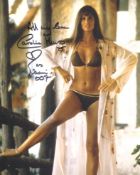 007 Bond girl Caroline Munro signed sexy pose 8x10 photo. Good condition. All autographs come with a