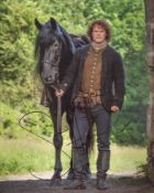 Outlander actor Sam Heughan signed 8x10 photo. Good condition. All autographs come with a