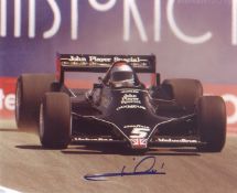 Mario Andretti signed10x8 picture racing in F1 car. Good condition. All autographs come with a