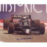 Mario Andretti signed10x8 picture racing in F1 car. Good condition. All autographs come with a