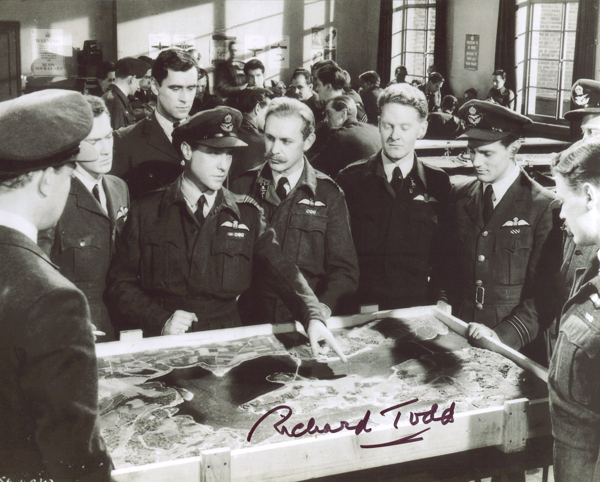 The Dambusters 8x10 movie scene photo signed by the late Richard Todd. Good condition. All
