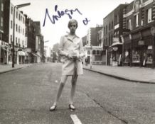 Twiggy, stunning 8x10 photo signed by supermodel and 60's fashion icon, Twiggy. Good condition.