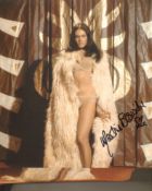 007 Bond actress Martine Beswick signed Prehistoric Women movie photo. Good condition. All