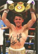 Boxing Anthony Crolla signed 12x8 colour photo pictured celebrating after defending his world title.