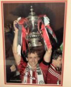 Bryan Robson Hand signed 12x8 Colour Photo in black effect Frame Measuring 17. 5x14 Overall.