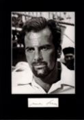 Maximillian Schell signature piece mounted below b/w photo. Approx overall size 13x10. Good