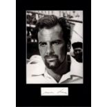 Maximillian Schell signature piece mounted below b/w photo. Approx overall size 13x10. Good