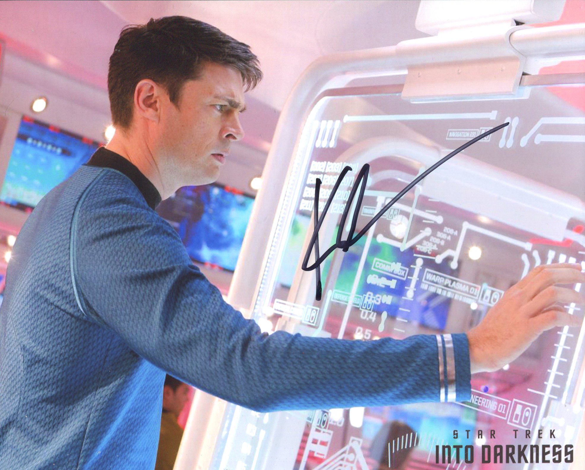 Star Trek 8x10 movie photo signed by actor Karl Urban who plays Doctor McCoy in the films. Good