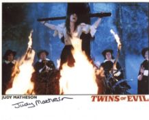 Twins of Evil 8x10 horror movie photo signed by actress Judy Matheson. Good condition. All