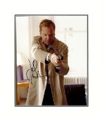 Kiefer Sutherland (24) signed photo. Mounted to approx. 13 x 11 inches frame. Good condition. Good