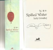 Sally Grindley signed hardback book titled Spilled Water. A clear signature from the author can be