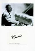 Count Basie signature piece below black and white photo. Good condition. All autographs come with