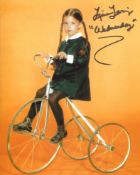 The Addams family 8x10 photo signed by actress Lisa Loring as Wednesday Addams. Good condition.