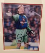 Legend Peter Schmeichel Hand signed 10x8 Colour photo in black wooden frame measuring 16. 5x14