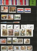 Yugoslavia Stamp Collection Off Paper Approximately 60 Stamps. Good condition. We combine postage on