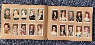 Cigarette card collection in album. Contains 50 Coronation series ceremonial dress 1937, 50 Kings