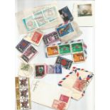 Assorted world stamp collection. Mixed on and off backing paper. May have some value hidden. Good.