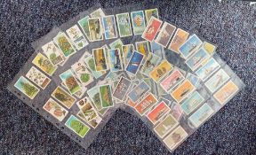 Brooke bond tea card collection in special pockets. Includes 49 trees in Britain 1966, 44