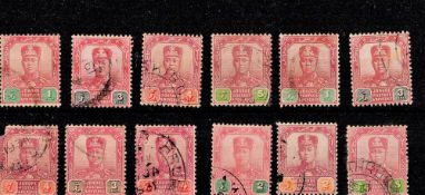 Johore Pre 1921 12 Stamps On Stockcard. Good condition. We combine postage on multiple winning