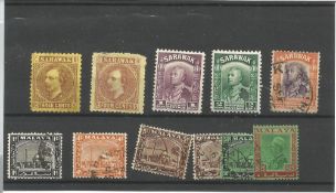 Sarawak and Selangor pre 1936 stamps on stockcard. 11 stamps. Good condition. We combine postage
