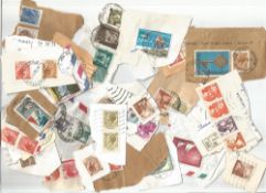 World stamp collection loose on backing paper. Good condition. We combine postage on multiple.