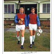 Autographed GEOFF HURST 16 x 12 Limited Edition - Col, depicting West Ham United's Bobby Moore and