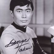 Star Trek original series 8x10 photo signed by actor George Takei as Sulu. Good condition. All
