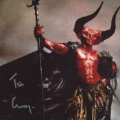 Tim Curry, actor signed 8x10 movie photo from the film 'Legend'. Very scarce. Good condition. All