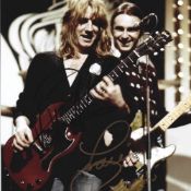 Rick Parfitt and Francis Rossi signed Status Quo 10x8 colour photo. Good condition. All autographs