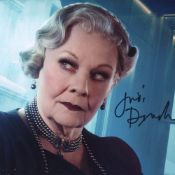 Poirot Murder on the Orient Express movie photo signed by Dame Judi Dench. Good condition. All