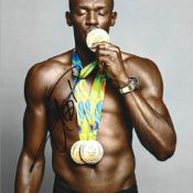 Usain Bolt signed 10x8 colour photo. Usain St. Leo Bolt, born 21 August 1986) is a retired