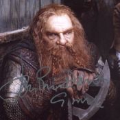 Lord of the Rings 8x10 movie photo signed by actor Jonathan Rhys-Davies as Gimli. Good condition.