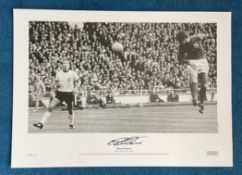 Geoff Hurst signed 22x16 1966 World Cup Final black and white print Geoff Hurst scores the first