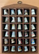 Collection of 30 Varied Bone China Thimbles, Set within a display shelf. Contains RNLI Thimbles,