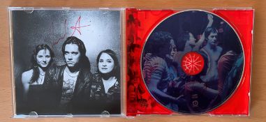 Rufus Wainwright Poses Signed CD Sleeve and CD with case. Personally Signed 3 Times in red marker