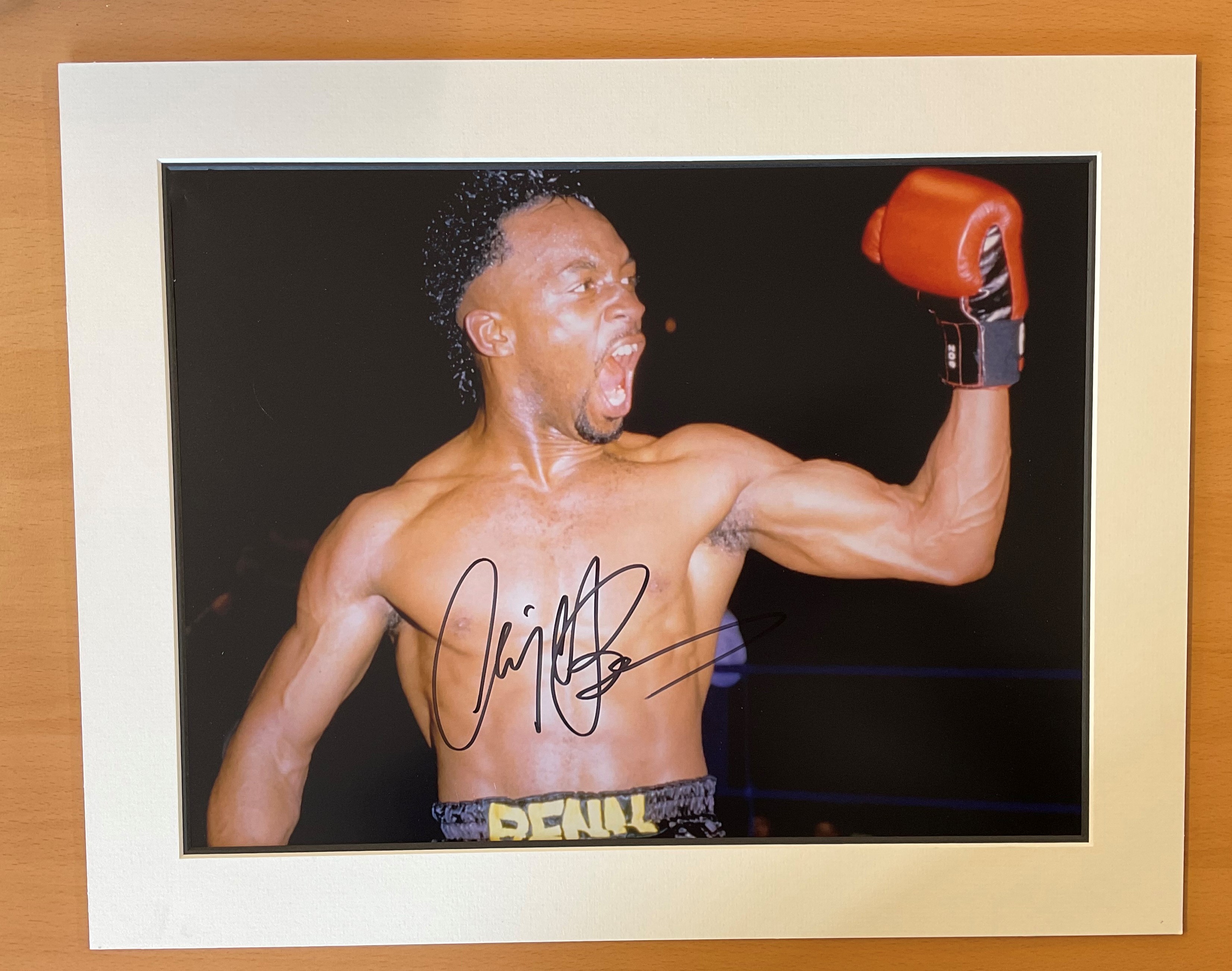 Boxer Nigel Benn Personally Signed 16x12 Colour Photo, Mounted to an overall size of 19x15. Nigel