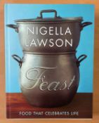 Nigella Lawson Personally Signed Book Titled Feast First Edition Hardback Book. Signed on the rear