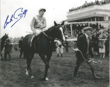 Lester Piggott signed 10x8 black and white photo. Good condition. All autographs come with a