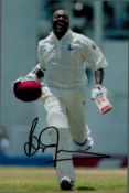 Brian Lara signed 12x8 colour cricket photo. Trinidadian former international cricketer widely
