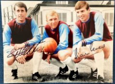 Geoff Hurst and Martin Peters signed 16x12 colour photo pictured with their West Ham United team
