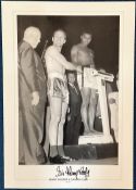 Henry Cooper signed 20x14 black and white print pictured at the weigh in for his fight with